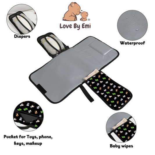 image of portable baby change pad by Love By Emi of the popular cartoon character print design that is very giftable outlining diaper, wipes and toy pockets