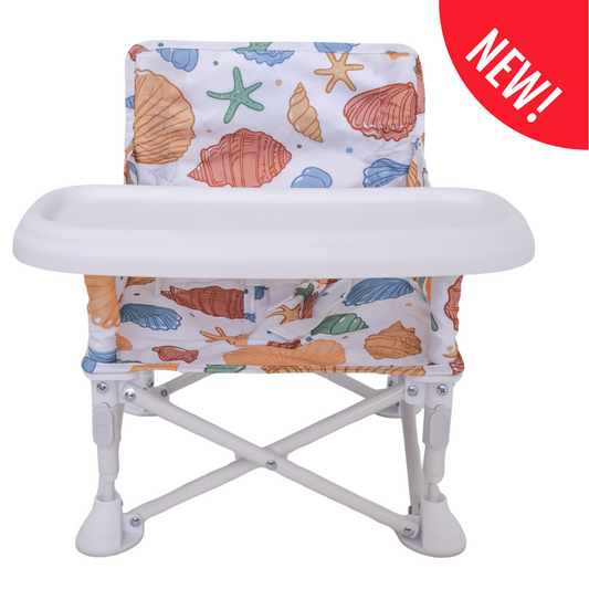 Children's folding chair with shell pattern on a white background